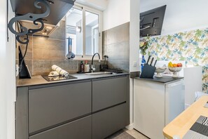 Fridge, microwave, coffee/tea maker, toaster