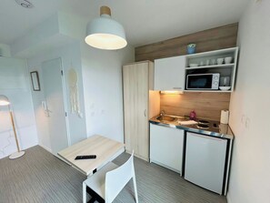 Fridge, microwave, coffee/tea maker, toaster