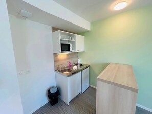Fridge, microwave, coffee/tea maker, toaster