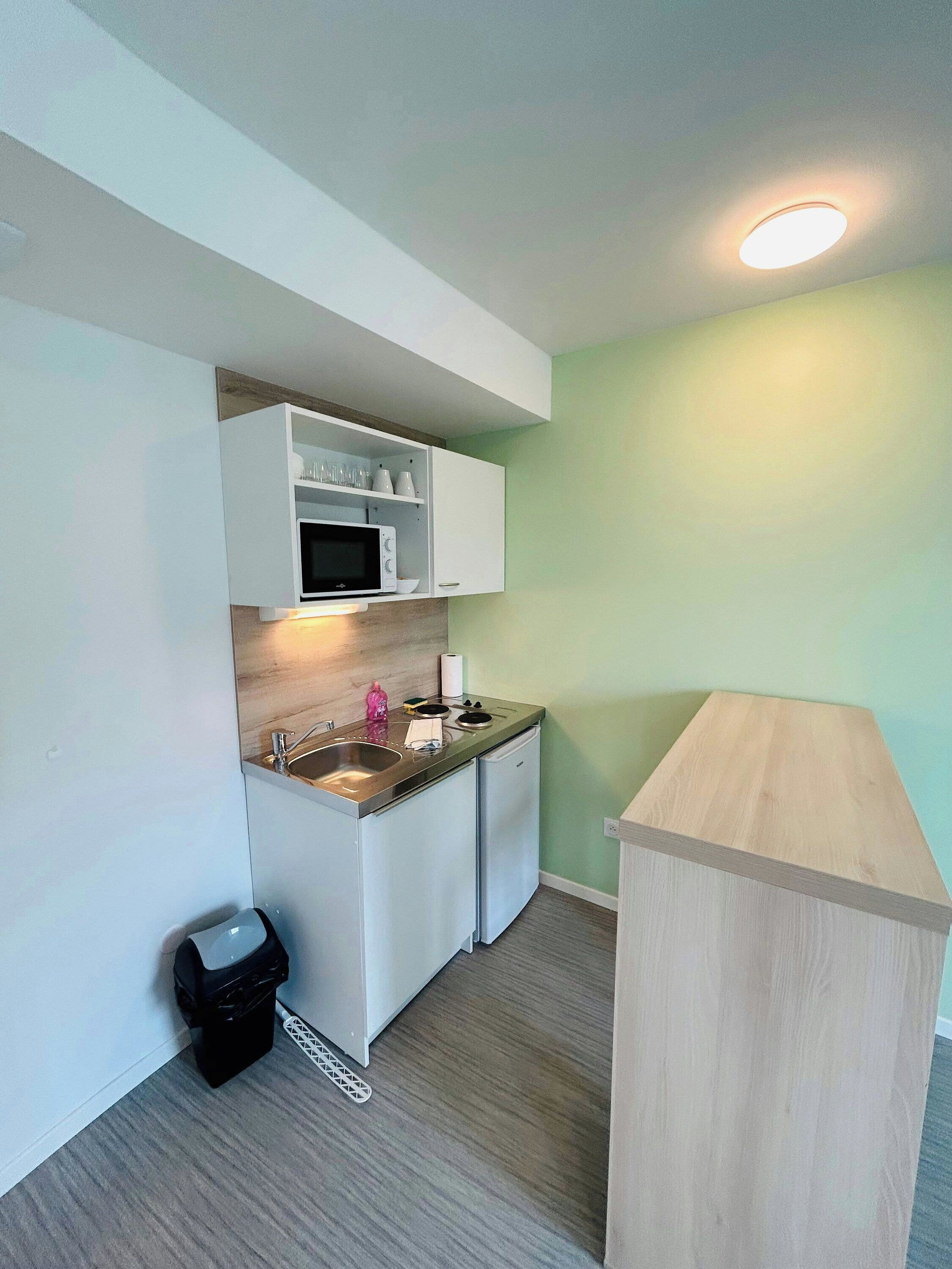 Fridge, microwave, coffee/tea maker, toaster