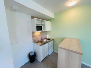 Fridge, microwave, coffee/tea maker, toaster