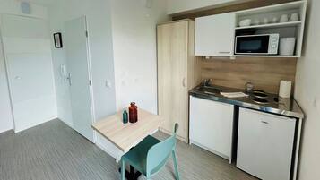 Fridge, microwave, coffee/tea maker, toaster