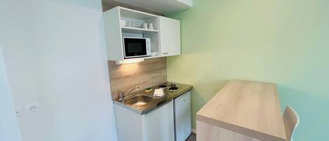 Fridge, microwave, coffee/tea maker, toaster