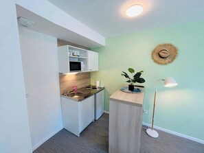 Fridge, microwave, coffee/tea maker, toaster