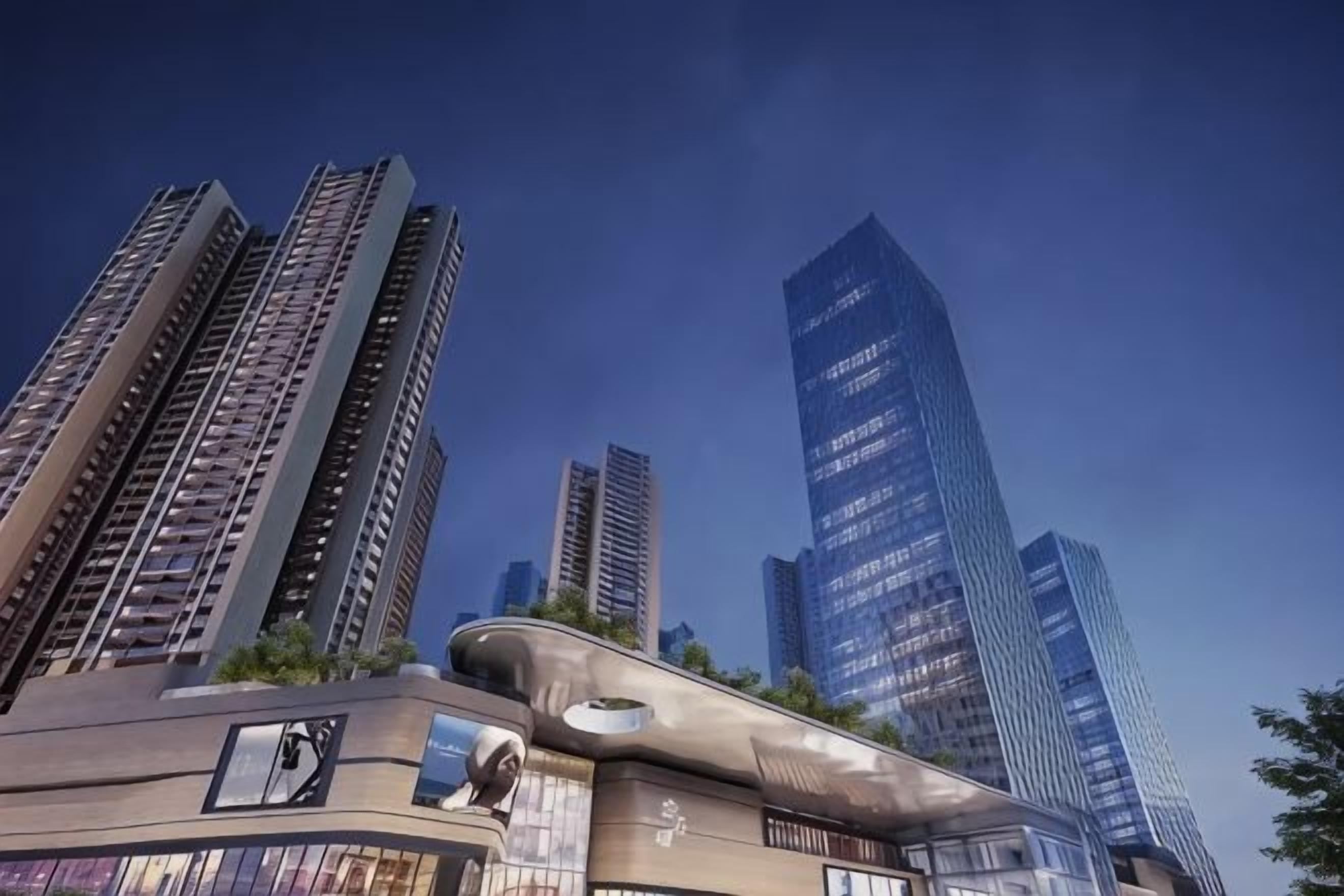 A modern high-rise building with a unique curved facade, surrounded by other tall buildings.