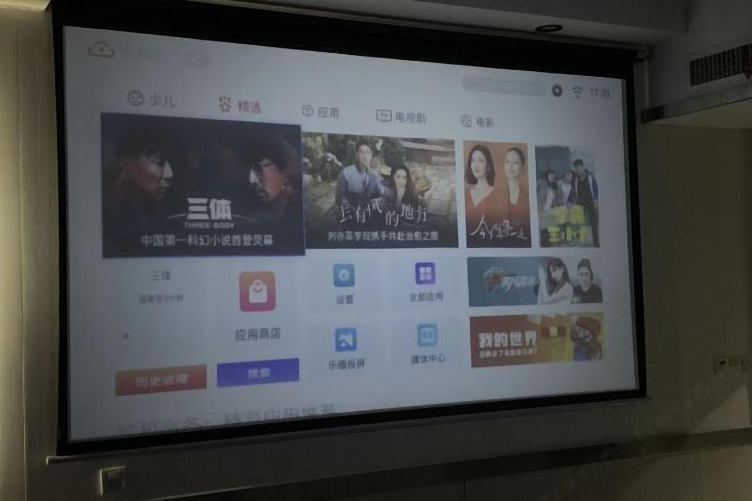 A digital screen displaying a selection of movies and TV shows with their titles and images.