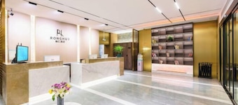 Korla Ronghui Yi Hotel (Xiangli Avenue Food Street Branch)