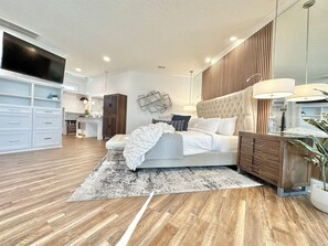2 habitaciones, tabla de planchar con plancha y cuna de viaje
