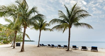 Elegant 2BR Villa w/ Shared Pool, Beachfront Prop.