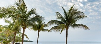 Elegant 2BR Villa w/ Shared Pool, Beachfront Prop.