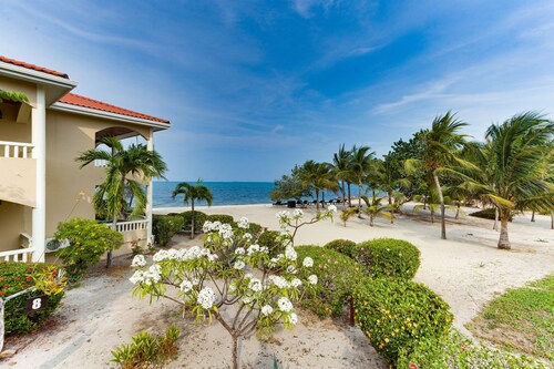 Elegant 2BR Villa w/ Shared Pool, Beachfront Prop.
