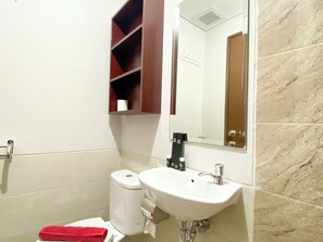 Deluxe Studio | Bathroom | Shower, towels - Well Furnished Studio Apartment At Transpark Juanda Bekasi Timur (Bekasi)