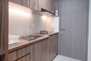 Deluxe Apartment | Private kitchen | Full-sized fridge, stovetop - Good Place And Homey 1Br At Tamansari Bintaro Mansion Apartment (South Tangerang)