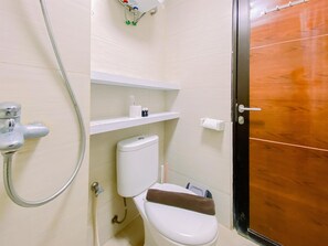 Departamento Deluxe | Baño | Regadera y toallas
