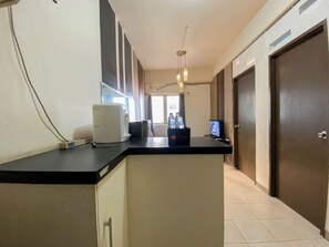 Deluxe Apartment | Private kitchen | Fridge, stovetop, dining tables, kitchen islands - Nice 2Br At Apartment Suites @Metro (Bandung)