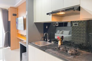 Deluxe Studio | Private kitchen - Homey And Cozy Living Studio At West Vista Apartment (Jakarta)