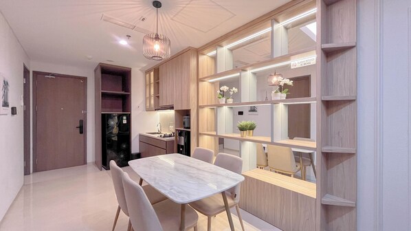 Deluxe Apartment | Private kitchen | Full-size fridge, stovetop, dining tables - Modern Designed 2Br At 31 Sudirman Makassar Apartment (Makassar)