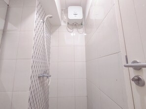 Bathroom - Simple And Restful Studio At Tanglin Supermall Mansion Apartment (Surabaya)