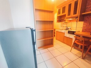 Deluxe Studio | Private kitchen - Modern And Comfy Studio (No Kitchen) At The City Square Apartment (Surabaya)