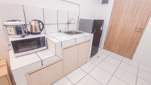 Deluxe Apartment | Private kitchen - Minimalist And Comfortable Stay 1Br (No Kitchen) At The City Square Apartment (Surabaya)
