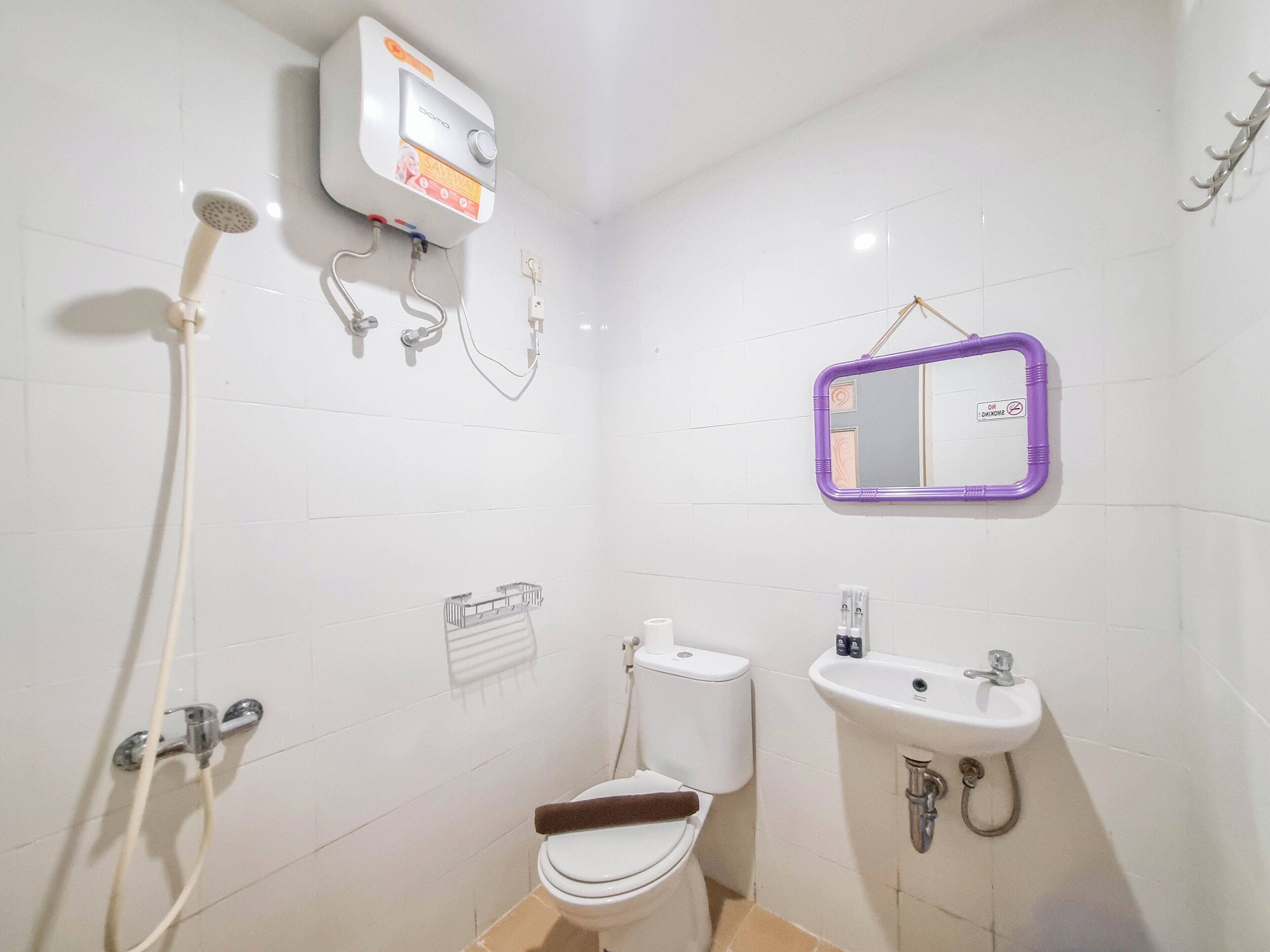 Deluxe-studiolejlighed | Badeværelse | Bruser, håndklæder