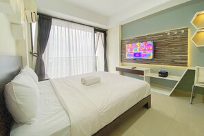 Deluxe Studio | Desk, free WiFi - The Modern Studio Room At Beverly Dago Apartment (Bandung)