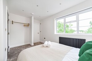 2 dormitorios, tabla de planchar con plancha, wifi gratis y ropa de cama