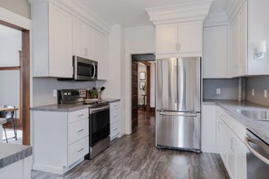 Fridge, microwave, oven, stovetop - *HOT TUB* Character home minutes to downtown Fargo & NDSU! (Fargo)