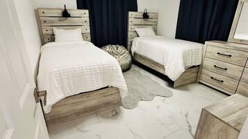 3 bedrooms, desk, iron/ironing board, travel crib