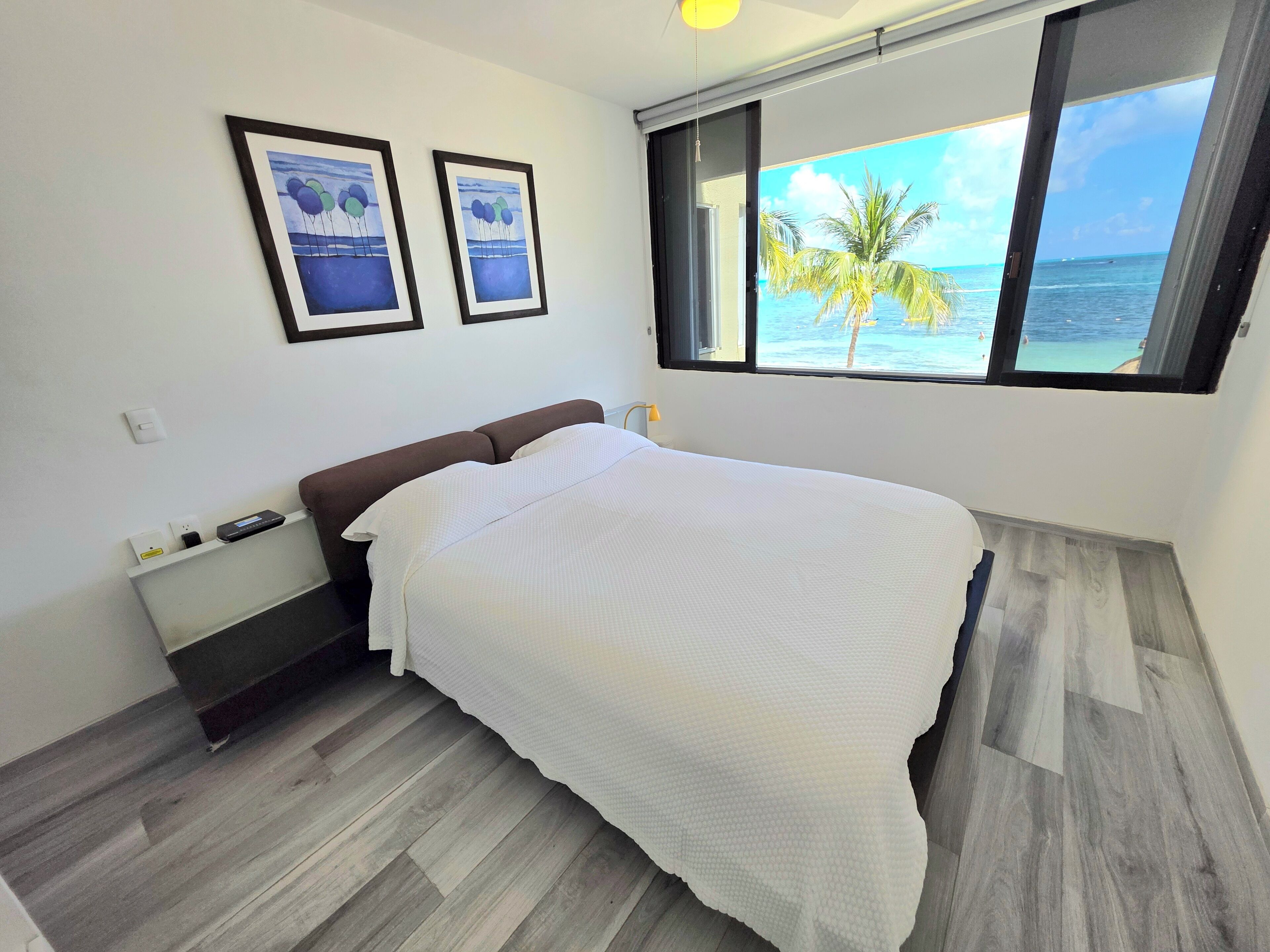 Apartamento, vista parcial para o oceano | 2 quartos, Wi-Fi de cortesia, roupa de cama