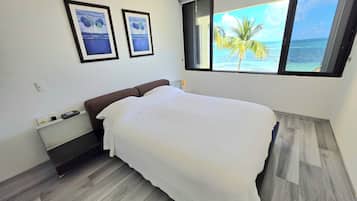 Apartamento, vista parcial para o oceano | 2 quartos, Wi-Fi de cortesia, roupa de cama