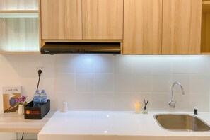 Estudio Deluxe | Cocina privada | Frigobar y parrilla de estufa 