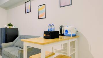 Apartamento Deluxe | Zona de estar