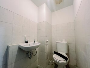 Deluxe Apartment | Bathroom | Shower, free toiletries, towels - Compact And Relaxing 2Br At Suncity Residence Apartment (Sidoarjo)