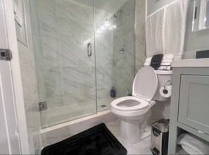 Hair dryer, towels, soap, toilet paper