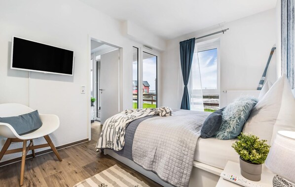 2 slaapkamers, een strijkplank/strijkijzer, reisbedje, gratis wifi