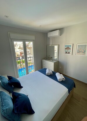 2 habitaciones, tabla de planchar con plancha, wifi y ropa de cama 