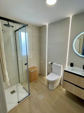 Hair dryer, towels, soap, toilet paper