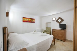 1 slaapkamer, een strijkplank/strijkijzer, wifi, beddengoed