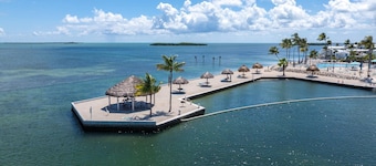 Salty Breeze #161 Canal-Front Retreat with Dock, Pool & Ocean Views
