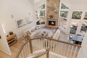 Smart TV, fireplace, foosball, books