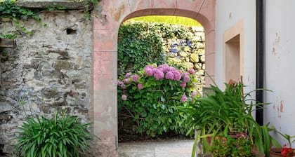 Ferienwohnung Cantina Romanese mit Bergblick, privatem Garten und WLAN