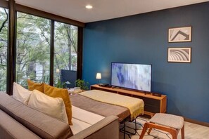 Fer et planche à repasser, lit parapluie, Wi-Fi, draps fournis