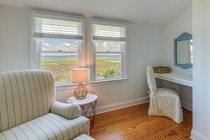 TV, fireplace, books - Waterfront Home w/ Screened Porch & Sunsets (Harkers Island)