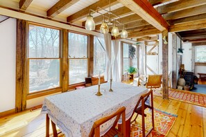Dining - Gorgeous woodland home with deck & firepit - walk to ocean bluffs & Rail Trail (Eastham)