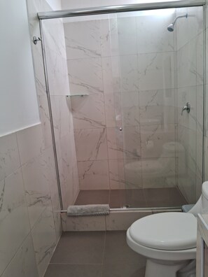 Shower, towels, soap, shampoo