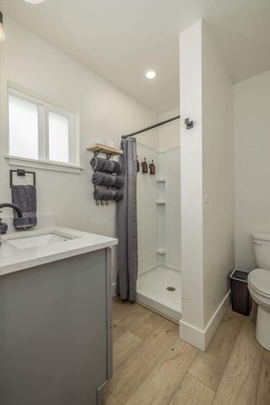 Shower, hair dryer, towels