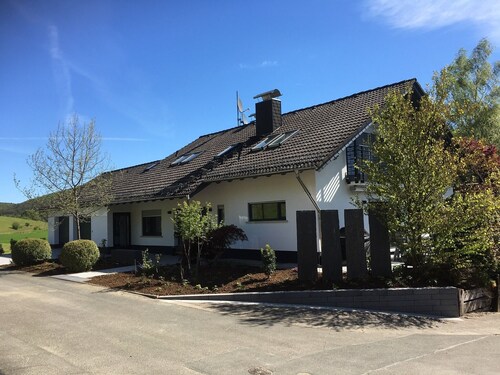 Vacation Apartment "Fewo Am Holing" with Beautiful View, Private Terrace, and Wi-Fi