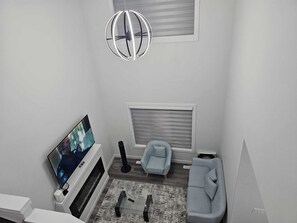 Smart TV, fireplace, books