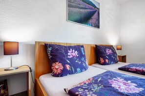 2 dormitorios, tabla de planchar con plancha, wifi gratis y ropa de cama